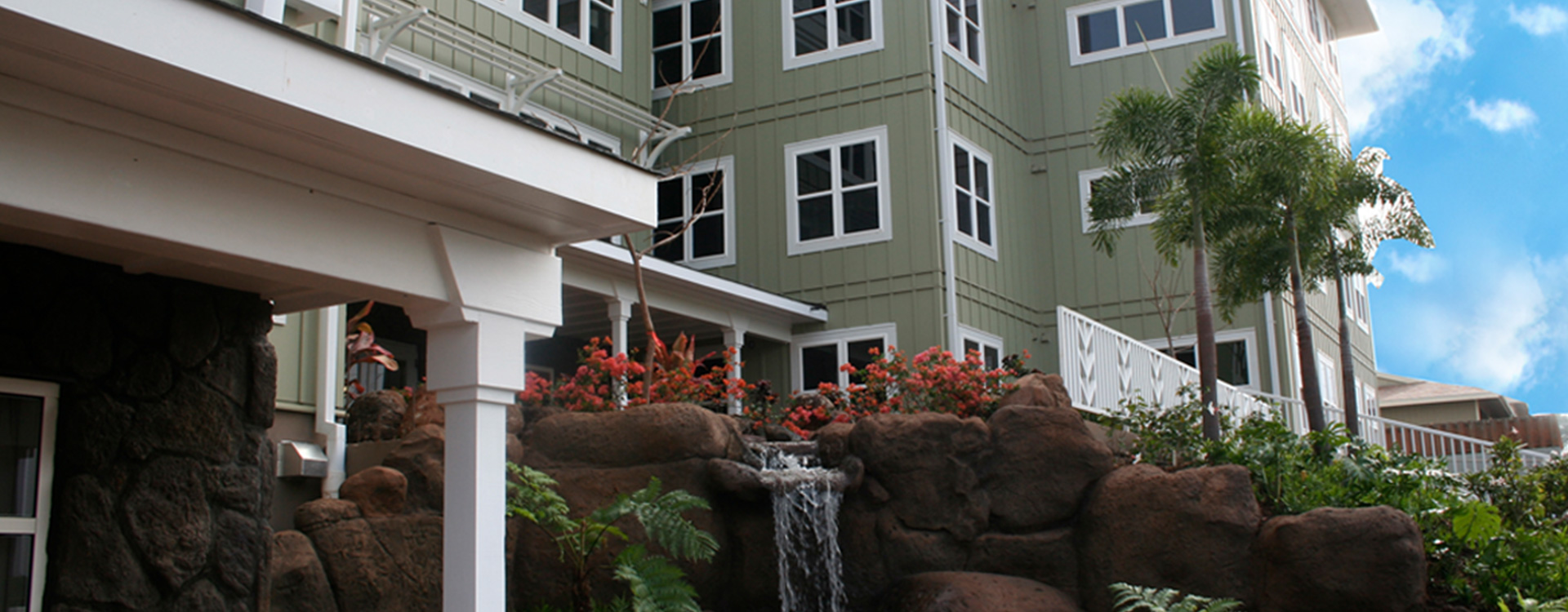 Rock waterfall garden at the entrance of The Plaza Assisted Living Mililani.