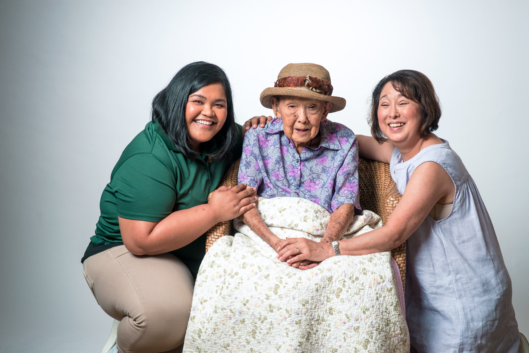 Plaza team members with a resident