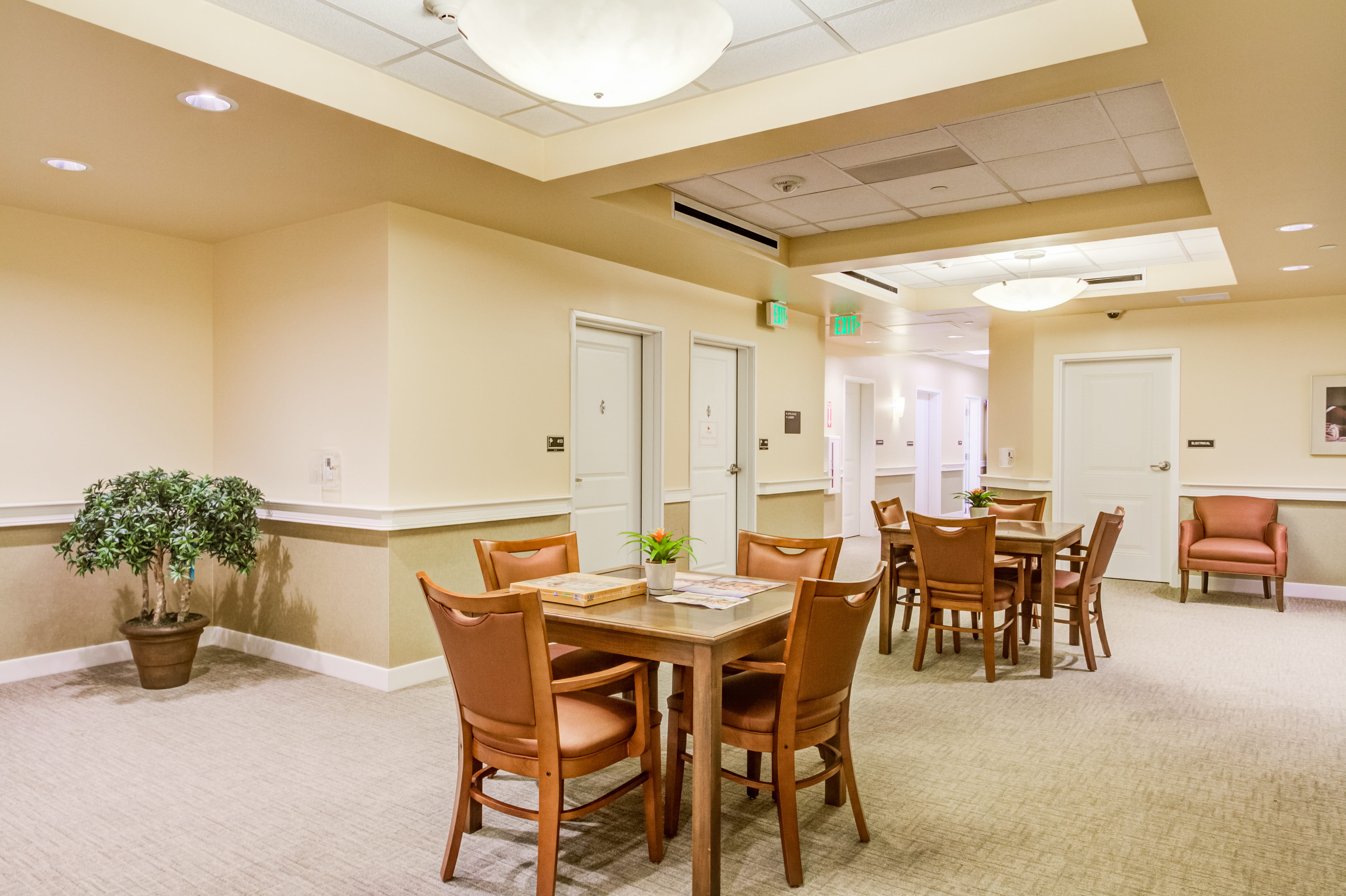 Resident seating and activity area at The Plaza at Pearl City.