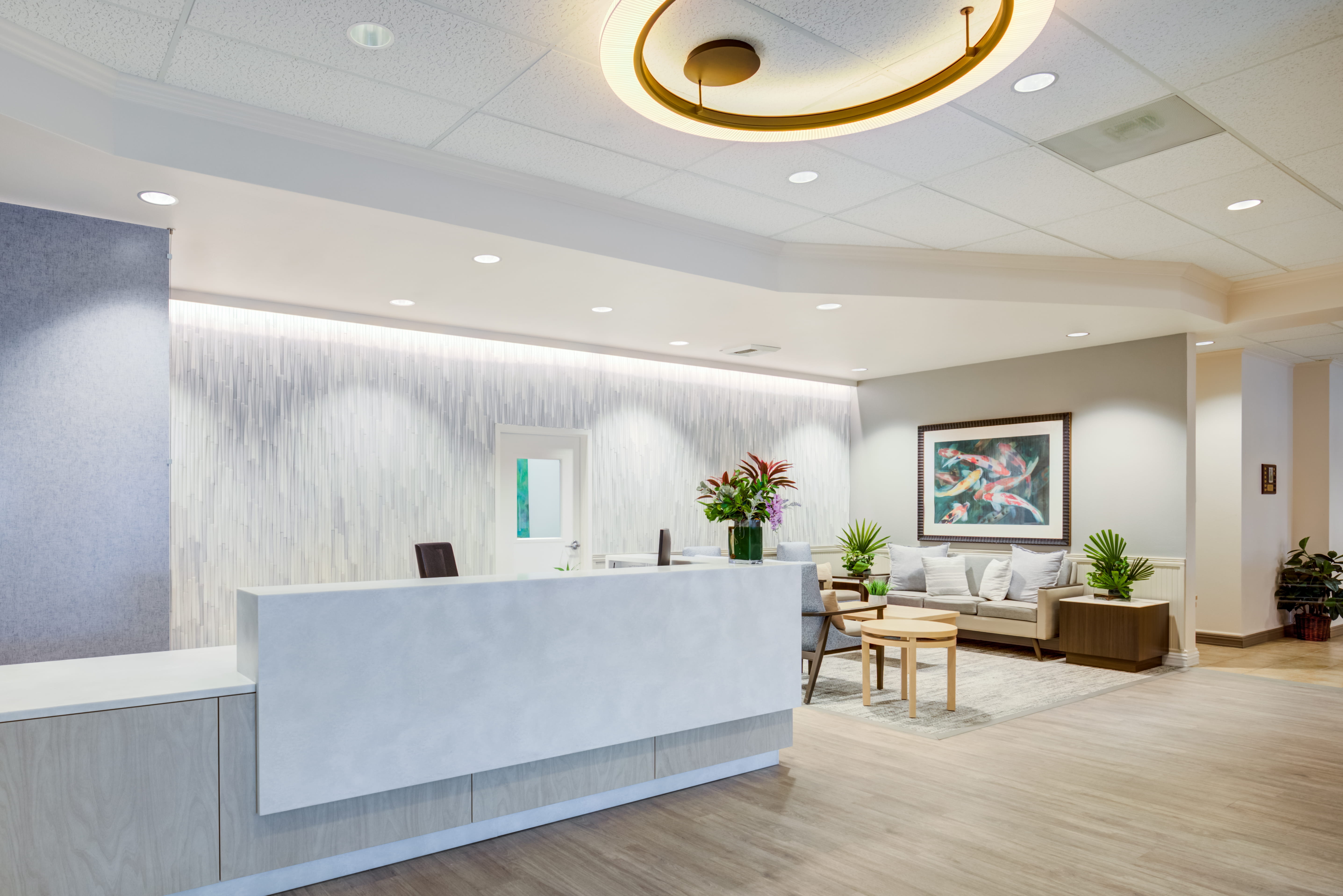 Modern reception desk and lobby area at The Plaza Assisted Living Punchbowl.